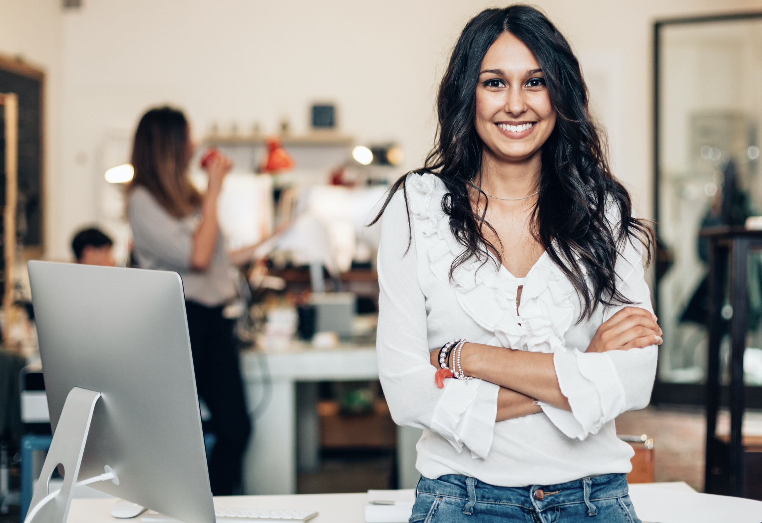 digital marking agency Nottingham girl smiling at desk