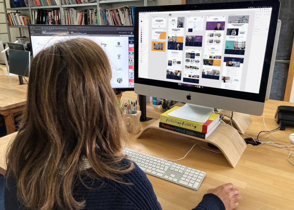 Girl working on computer at a digital agency Nottingham